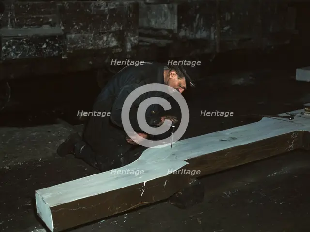 Section of a locomotive frame, which will be welded to replace a broken...train, Chicago, 1942. Creator: Jack Delano.