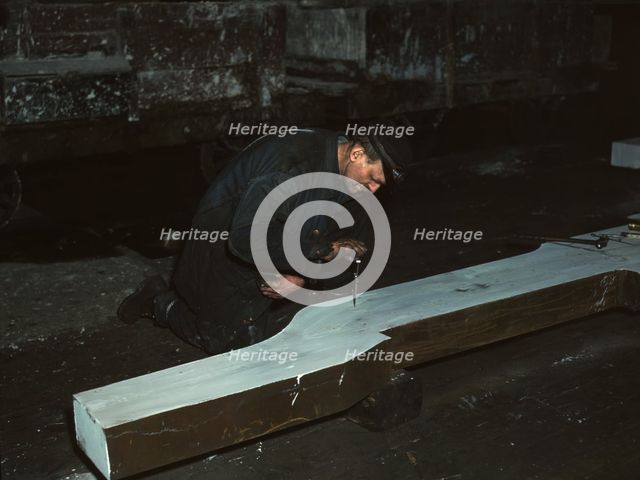 Section of a locomotive frame, which will be welded to replace a broken...train, Chicago, 1942. Creator: Jack Delano.
