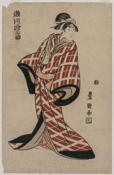 Segawa Michinosuke Wearing a Padded Plaid Robe, c. 1805. Creator: Utagawa Toyokuni (Japanese, 1769-1825)