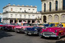 Selection of beautifully restored old American cars, alongside the Parque Central, Havana, Cuba,2024 Creator: Ethel Davies