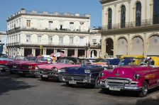 Selection of beautifully restored old American cars, alongside the Parque Central, Havana, Cuba,2024 Creator: Ethel Davies