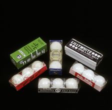 Selection of golf balls in their packaging, mid 20th century. Creators: Wilson Sporting Goods, Spalding, US Rubber Company, Victor Comptometer Corporation
