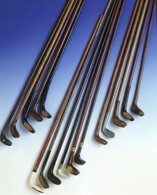 Selection of walking sticks shaped like golf clubs, 1900-1925. Creator: Unknown