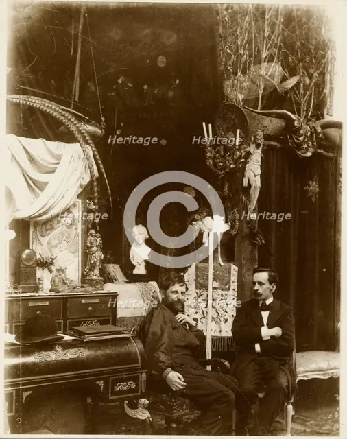 Self-Portrait with possibly Paul Gauguin in His Studio, Rue du Val-de-Grâce, Paris, neg 1899. Creator: Alphonse Mucha.