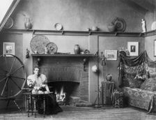 Self-portrait of photographer Frances Benjamin Johnston in her studio at...Washington, D.C., c1900. Creator: Frances Benjamin Johnston