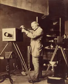 Self-portrait preparing a Collodion plate, 1856-1859. Creator: Horatio Ross