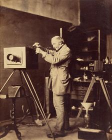 Self-portrait preparing a Collodion plate, 1856-1859. Creator: Horatio Ross
