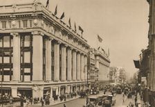 Selfridge's and the last of the old Oxford Street shops that the building engulfed c1935. Creator: Unknown