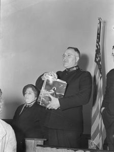 Selling Easter edition of the "War Cry", Salvation army, San Francisco, California, 1939. Creator: Dorothea Lange