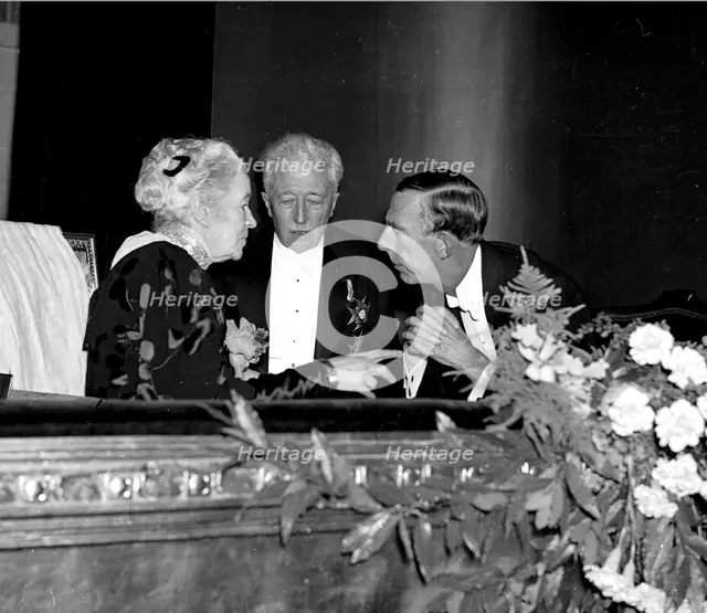 Selma Lagerlof with princes Eugen and Wilhelm, for her 80th birthday, the Dramaten, 1938.
 Creator: Unknown.