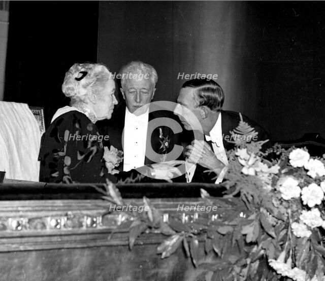 Selma Lagerlof with princes Eugen and Wilhelm, for her 80th birthday, the Dramaten, 1938.
 Creator: Unknown.