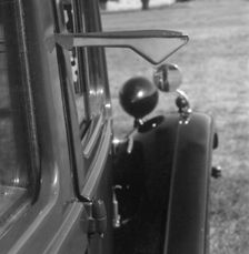 Semaphore indicator arm on 1937 Morris 8 series II. Creator: Unknown