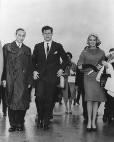 Senator Edward Kennedy and his wife Joan arriving at Malpens Airport, Milan, Italy, 1961. Creator: Unknown