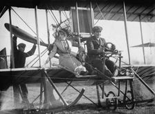 Senorita Lenore Riviero [sic] with Anthony Jannus; In Rex Smith Aeroplane, 1912. Creator: Harris & Ewing