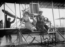 Senorita Lenore Riviero [sic] with Anthony Jannus; In Rex Smith Aeroplane, 1912. Creator: Harris & Ewing
