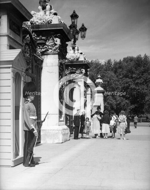 Sentry at Buckingham Palace, London, c1955.  Creator: Arthur Charles Kirby Ware.