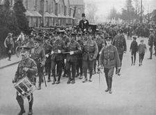 Sergeants hauling the bridal coach from the church 1915