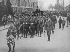 Sergeants hauling the bridal coach from the church 1915