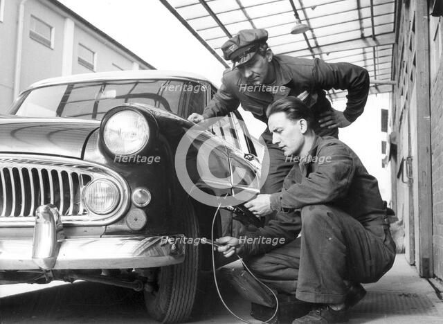 Service at a garage, Trelleborg, Sweden, 1950s. Artist: Unknown