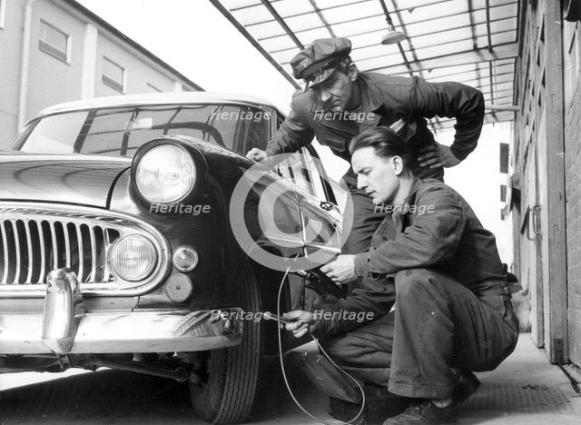 Service at a garage, Trelleborg, Sweden, 1950s. Creator: Unknown.