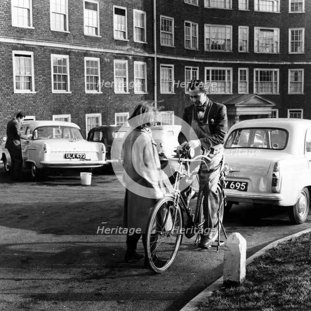 Services to the public, an East End Street, 1950s. Creator: Henry Grant.