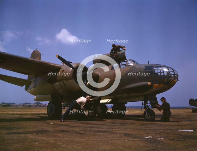 Servicing [an] A-20 bomber, Langley Field, Va., 1942. Creator: Alfred T Palmer.