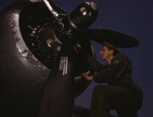 Servicing [an] A-20 bomber, Langley Field, Va., 1942. Creator: Alfred T Palmer