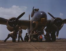 Servicing an A-20 bomber, Langley Field, Va., 1942. Creator: Alfred T Palmer