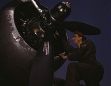 Servicing [an] A-20 bomber, Langley Field, Va., 1942. Creator: Alfred T Palmer