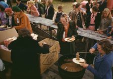 Serving pinto beans at the Pie Town, New Mexico Fair barbeque, 1940. Creator: Russell Lee