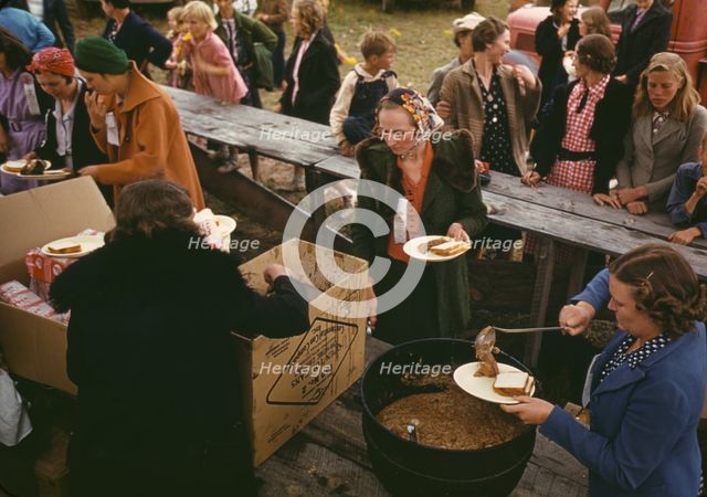 Serving pinto beans at the Pie Town, New Mexico Fair barbeque, 1940. Creator: Russell Lee.