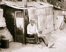 Shack made of barrels and tar paper, St Louis, Missouri, USA, Great Depression, 1931. Creator: Unknown