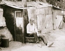 Shack made of barrels and tar paper, St Louis, Missouri, USA, Great Depression, 1931