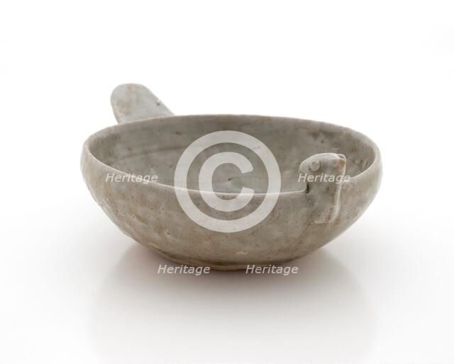 Shallow dish with bird head and tail, 265-316. Creator: Unknown.