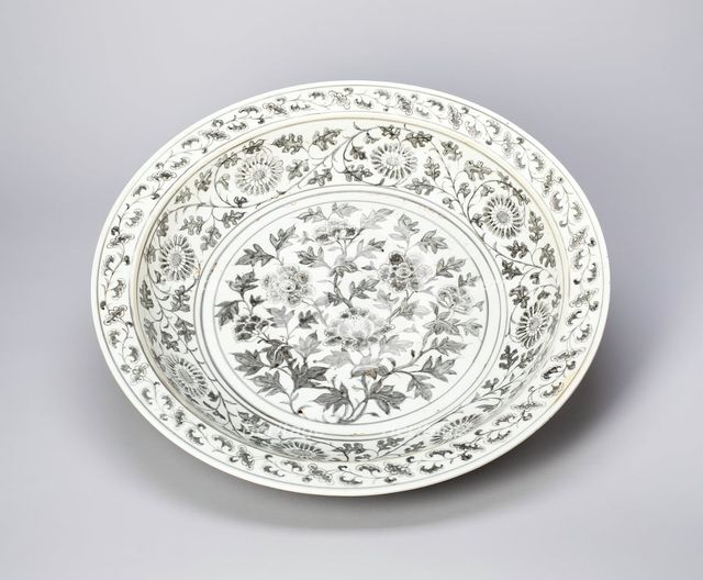 Shallow Dish with Peony Scrolls, Chrysanthemum Spray, and Key-Fret..., Ming dynasty, late 14th cent. Creator: Unknown.