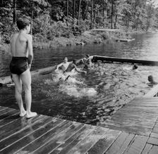 Shallow swimming pool for learners at Camp Nathan Hale, Southfields, New York, 1943 Creator: Gordon Parks