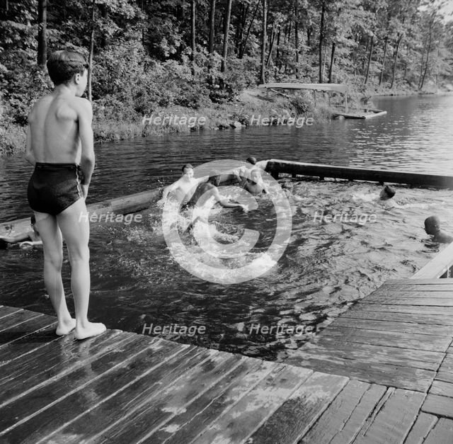 Shallow swimming pool for learners at Camp Nathan Hale, Southfields, New York, 1943 Creator: Gordon Parks.