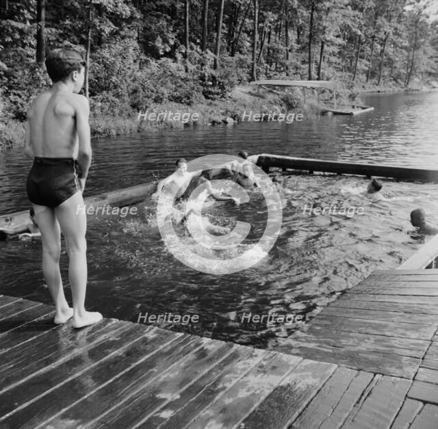 Shallow swimming pool for learners at Camp Nathan Hale, Southfields, New York, 1943 Creator: Gordon Parks.