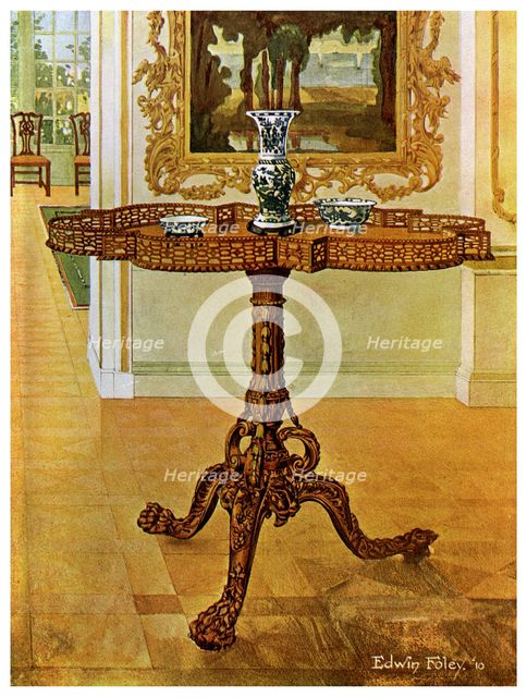 Shaped fret rimmed gallery table, Chippendale School, 1911-1912.Artist: Edwin Foley