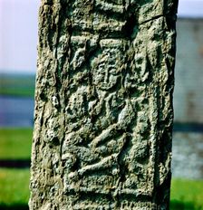Sheila-na-gig on Celtic cross-shaft, Clonmacnoise, Co.Offaly, Ireland