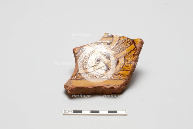 sherd, red body, white slip, yellow-brown glaze, Mamluk period, 1250-1516. Creator: Unknown.