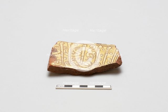 sherd, red body, white slip, yellow glaze, Mamluk period, 1250-1516. Creator: Unknown.