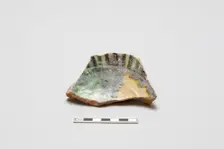 sherd, red body, white slip, yellow, green, black glaze, Mamluk period, 1250-1516. Creator: Unknown