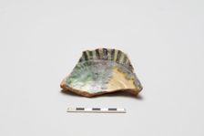 sherd, red body, white slip, yellow, green, black glaze, Mamluk period, 1250-1516. Creator: Unknown