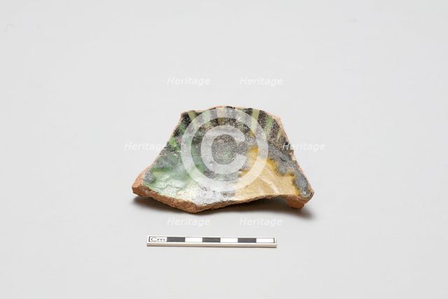 sherd, red body, white slip, yellow, green, black glaze, Mamluk period, 1250-1516. Creator: Unknown.