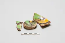 sherd, red body, white slip, yellow, green, black glaze, Mamluk period, 1250-1516. Creator: Unknown