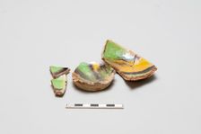 sherd, red body, white slip, yellow, green, black glaze, Mamluk period, 1250-1516. Creator: Unknown