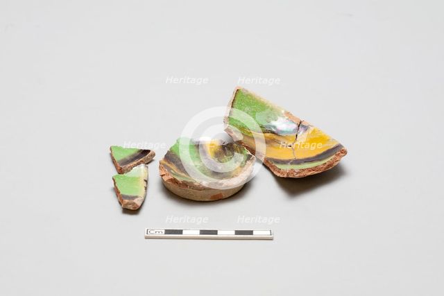 sherd, red body, white slip, yellow, green, black glaze, Mamluk period, 1250-1516. Creator: Unknown.