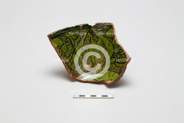 sherd, red body, white slip, green glaze, Mamluk period, 1250-1516. Creator: Unknown.