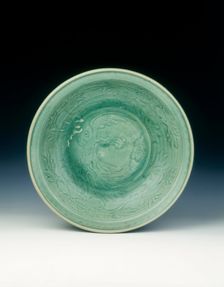 Shichikan celadon dish with phoenix and peonies, Ming dynasty, China, 16th century